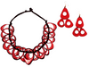 necklace made of red and black tagua on a black faux leather with red drop earrings